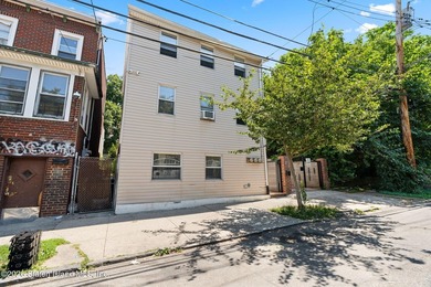 Come and check this amazing 3 Family Home in Excellent Condition - photo 5