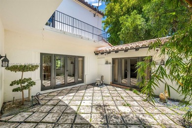 Beautiful Mediterranean villa sited on a prime corner lot on - photo 19