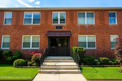 Welcome to this bright and beautifully updated second-floor - photo 1
