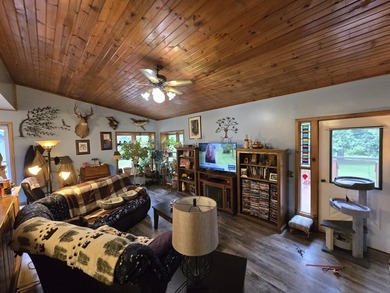 Private two bedroom home on beautifully wooded 9.36 acres with - photo 8