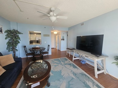 This desirable *Reno* model one-bedroom residence on the 10th