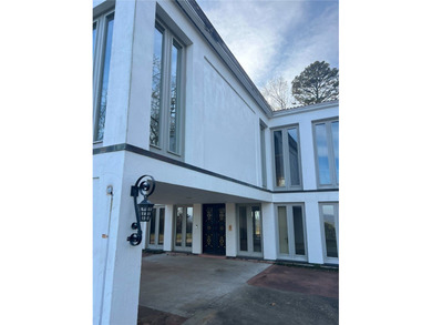 One of Russellville's most iconic homes, this Mediterranean - photo 12