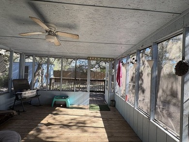 Hang up your fishing poles and settle into this charming coastal - photo 15