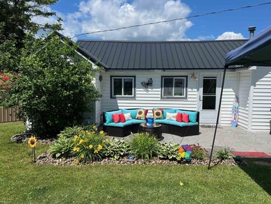 Over 100 feet of sandy lake frontage on highly sought-after Long - photo 2