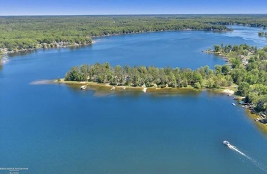 Over 100 feet of sandy lake frontage on highly sought-after Long - photo 3