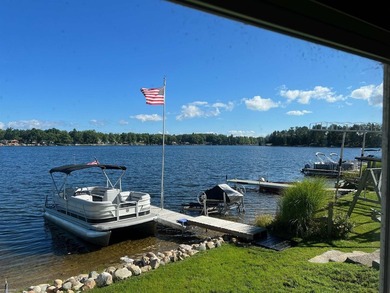Over 100 feet of sandy lake frontage on highly sought-after Long - photo 4