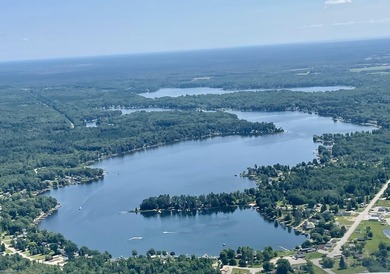 Over 100 feet of sandy lake frontage on highly sought-after Long - photo 5