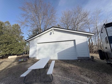 Over 100 feet of sandy lake frontage on highly sought-after Long - photo 8