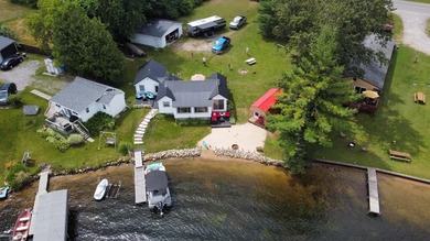 Over 100 feet of sandy lake frontage on highly sought-after Long - photo 9
