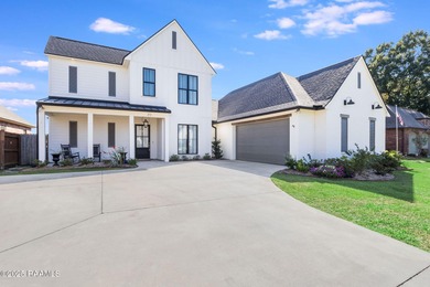 (private lake, pond, coastal) Home For Sale in Youngsville Louisiana