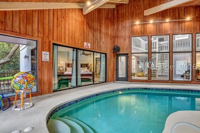 Unique home with a covered, heated pool and bi-fold doors that - photo 7