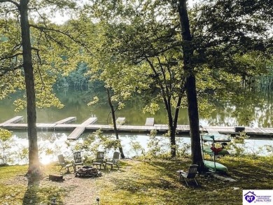 Tucked near the water's edge of Rough River Lake, your family - Lake Home For Sale in Hardinsburg, Kentucky