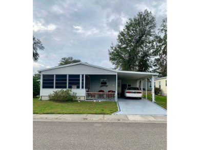 Lake Home For Sale in Zephyrhills, Florida