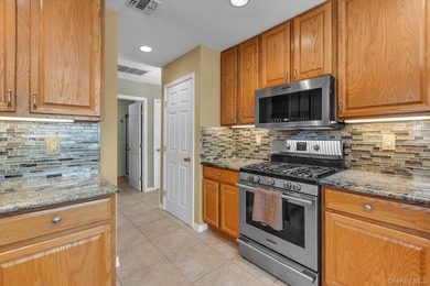 Welcome home to this highly sought-after, beautifully maintained - photo 8