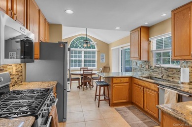 Welcome home to this highly sought-after, beautifully maintained - photo 9
