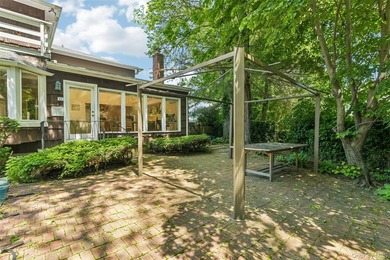 Large Center Hall Colonial in a prime Lawrence location. Set on - photo 39