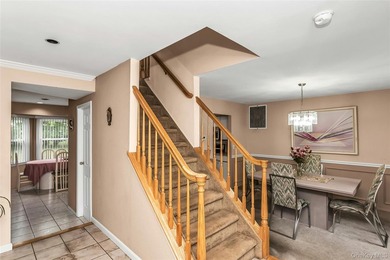 Welcome to a spacious and well-maintained Center Hall Colonial - photo 5