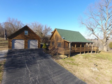 Searching for a log home near the lake? Here it is. This - Lake Home For Sale in Nancy, Kentucky