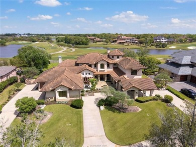 Located within the premier, gated Heron Lakes section of - photo 2