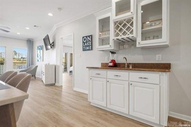 Experience lake living at its finest with this beautiful walk-in