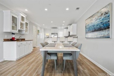 Experience lake living at its finest with this beautiful walk-in