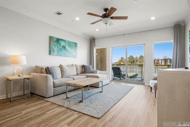 Experience lake living at its finest with this beautiful walk-in