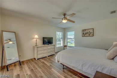 Welcome to this spacious waterfront pool home located in a - photo 11