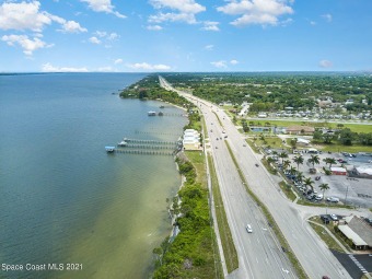 Lake Lot Off Market in Palm Shores, Florida