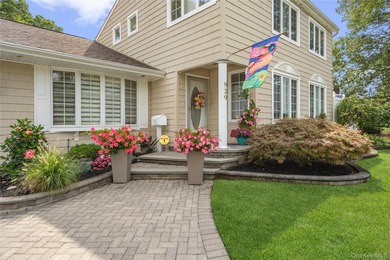 Welcome home to 939 Manor Lane in Bay Shore. This meticulously - photo 2