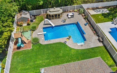 Welcome home to 939 Manor Lane in Bay Shore. This meticulously - photo 5