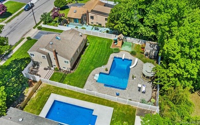 Welcome home to 939 Manor Lane in Bay Shore. This meticulously - photo 6