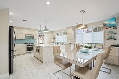 Welcome home to 939 Manor Lane in Bay Shore. This meticulously - photo 8