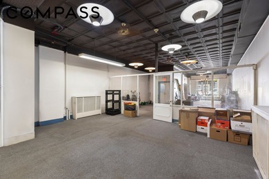 * Nestled on a vibrant stretch of West Houston between a row of - photo 3