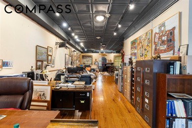 * Nestled on a vibrant stretch of West Houston between a row of - photo 6