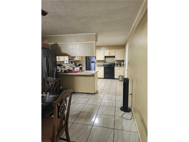 Great Location. 4 bedroom, 3 full bathroom homes is in need of - photo 5