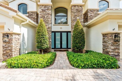 Beyond double entry doors, a remodeled iron staircase frames - photo 4