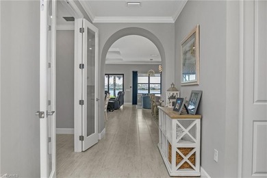 Welcome to 19165 Aqua Shore Drive, a pristine Summerwood floor