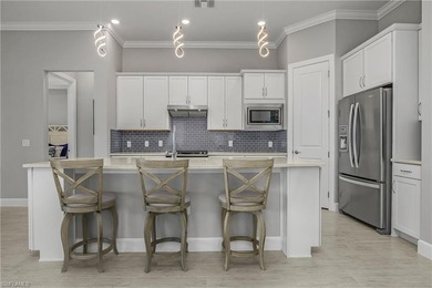 Welcome to 19165 Aqua Shore Drive, a pristine Summerwood floor