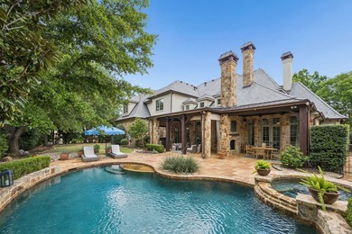 Nestled on a beautifully maintained lot, this stunning residence - photo 1