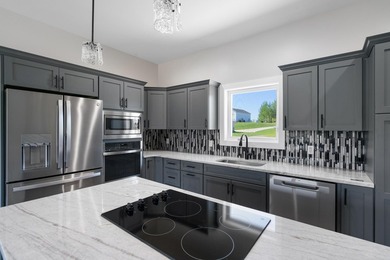 Brand new construction on the beautiful Cheboygan River! Enjoy - photo 17