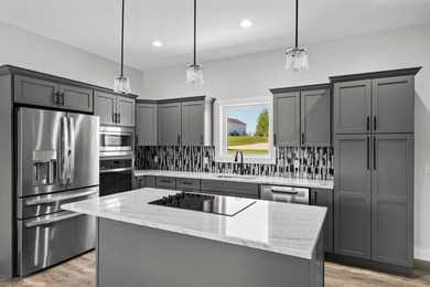 Brand new construction on the beautiful Cheboygan River! Enjoy - photo 18