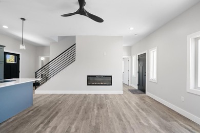 Brand new construction on the beautiful Cheboygan River! Enjoy - photo 21