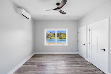 Brand new construction on the beautiful Cheboygan River! Enjoy - photo 25