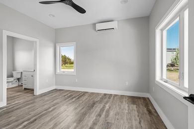 Brand new construction on the beautiful Cheboygan River! Enjoy - photo 29