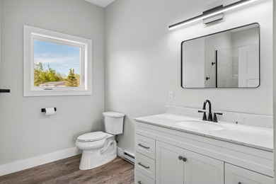 Brand new construction on the beautiful Cheboygan River! Enjoy - photo 30