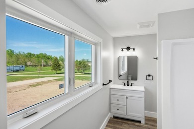 Brand new construction on the beautiful Cheboygan River! Enjoy - photo 43