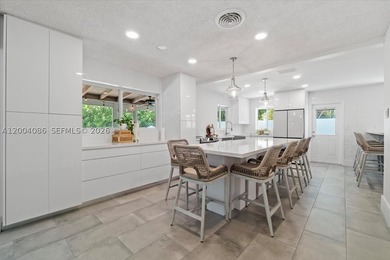 Beautifully updated home in the prestigious Coral Ridge Country - photo 8