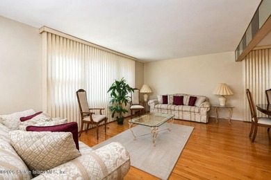 THIS TWO FAMILY HI-RANCH OFFERS A 3 BEDROOM MASTER PLUS A ONE - photo 5