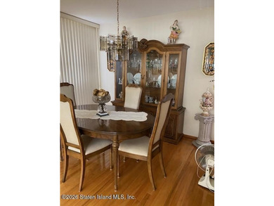 THIS TWO FAMILY HI-RANCH OFFERS A 3 BEDROOM MASTER PLUS A ONE - photo 7