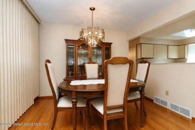 THIS TWO FAMILY HI-RANCH OFFERS A 3 BEDROOM MASTER PLUS A ONE - photo 8